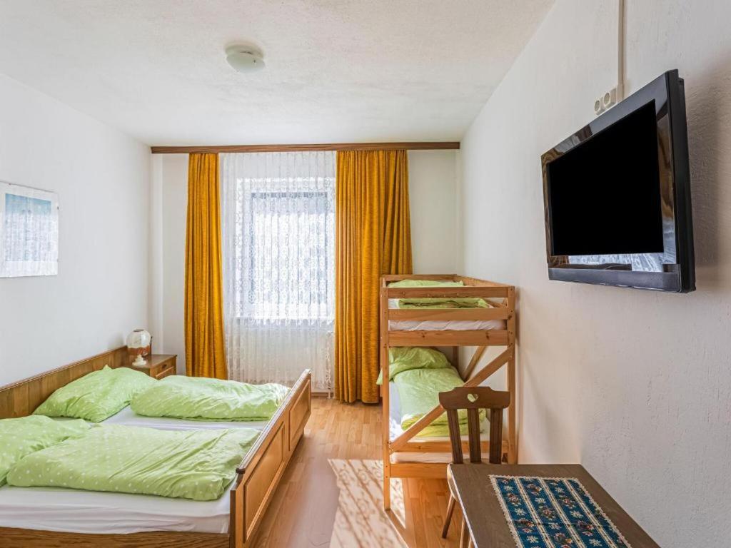Postel nebo postele na pokoji v ubytování Gasthof Wabitsch