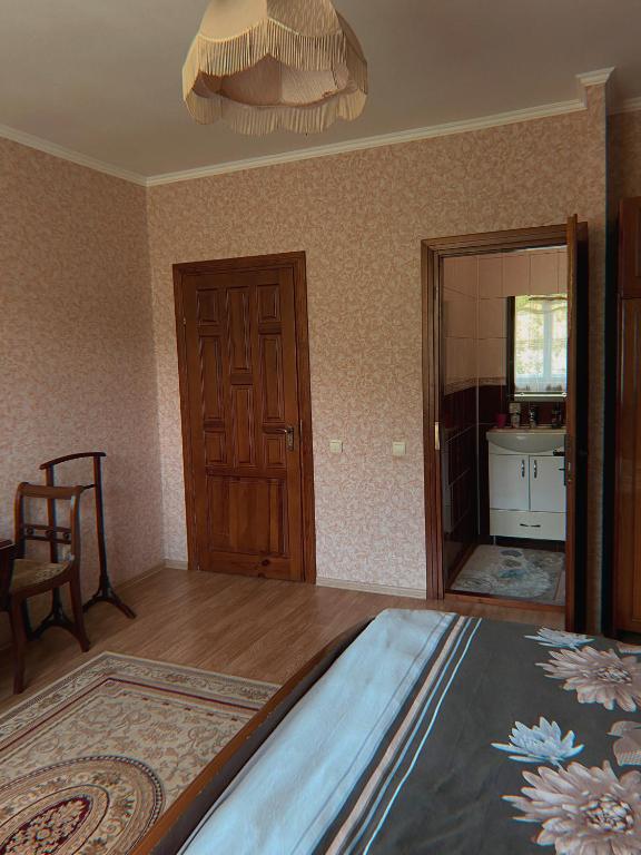 Postel nebo postele na pokoji v ubytování Вілла де Кампо