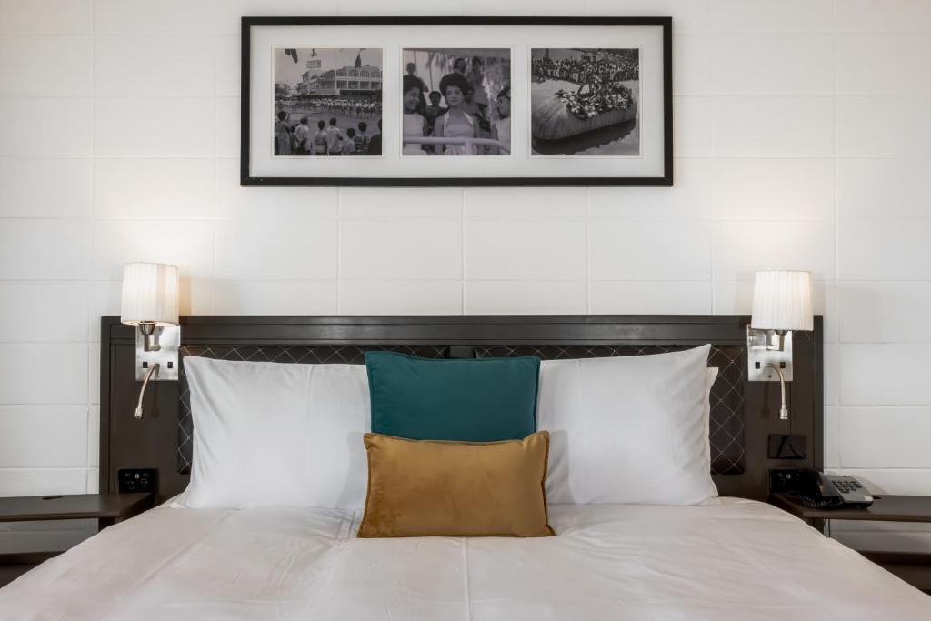Postel nebo postele na pokoji v ubytování Capricorn Hotel Suva