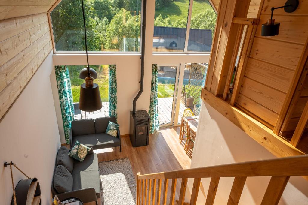 an overhead view of the living room of a tiny house at Stodoły Hołosanka Bieszczady in Polańczyk