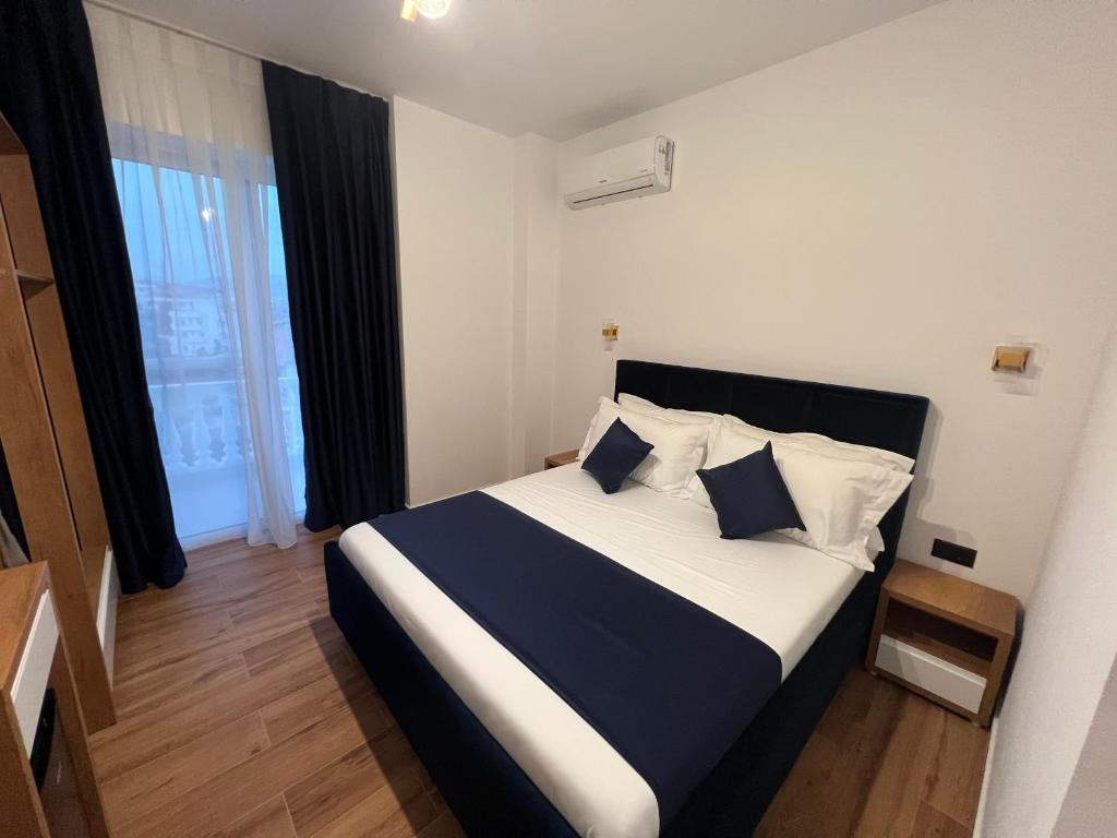 Cama o camas de una habitación en ILLYRIAN hotel Ksamil