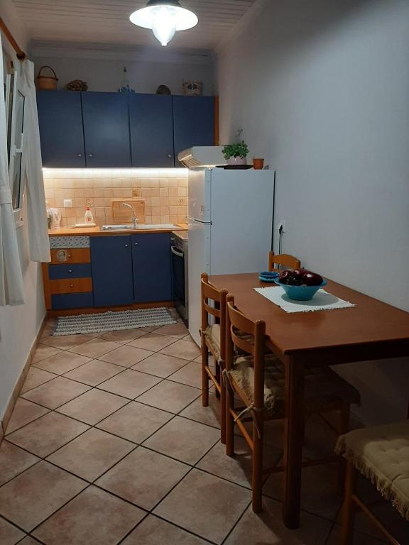 Kuchyň nebo kuchyňský kout v ubytování Theros Apartment