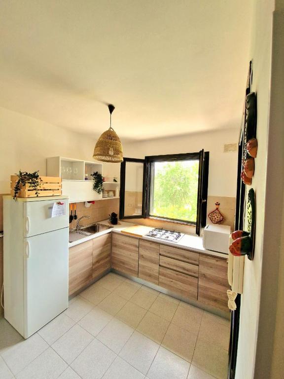 Kuchyň nebo kuchyňský kout v ubytování Casamarina Cristal Village
