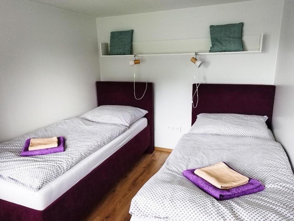 Postel nebo postele na pokoji v ubytování Ubytování na Hájence