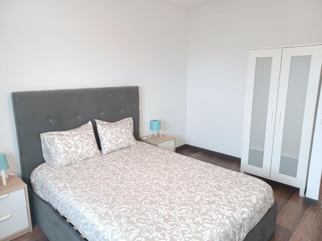 Postel nebo postele na pokoji v ubytování Oporto Sea Rooms