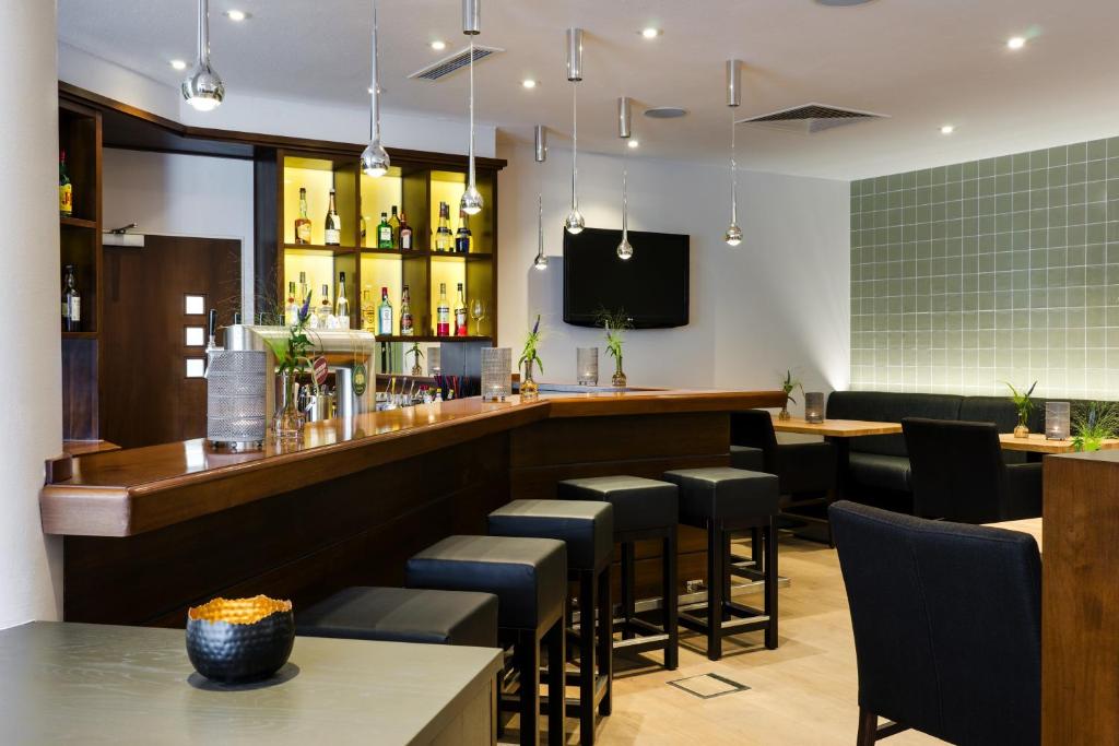 Lounge nebo bar v ubytování Upstalsboom Parkhotel