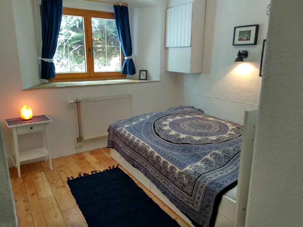 Postel nebo postele na pokoji v ubytování Yoga Resort AlpenRetreat
