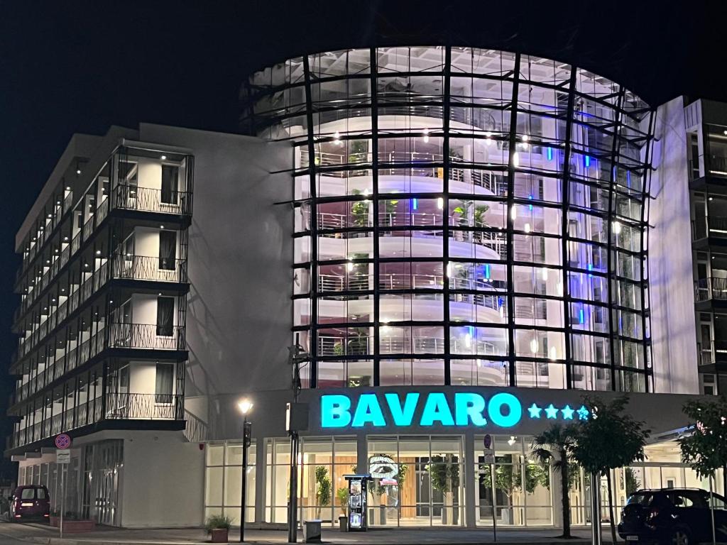 a large building with a sign in front of it at Hotel Bavaro in Sunny Beach