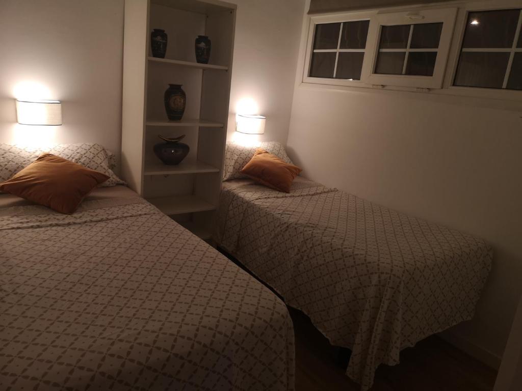 Postel nebo postele na pokoji v ubytování Casa Cosy Yumbo