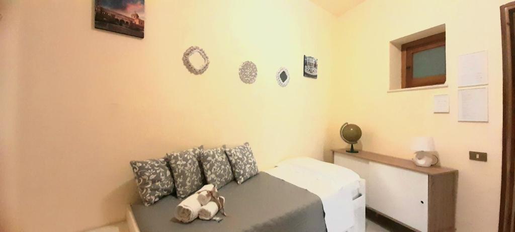 A bed or beds in a room at La Perla di Palermo
