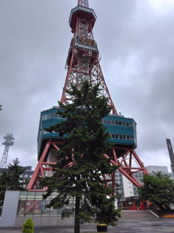 a christmas tree in front of the eiffel tower at aup178 in Sapporo