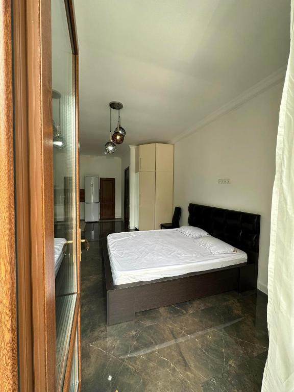 Postel nebo postele na pokoji v ubytování Guest House Nana