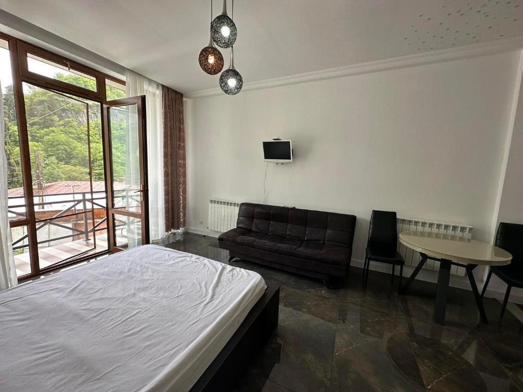 Postel nebo postele na pokoji v ubytování Guest House Nana