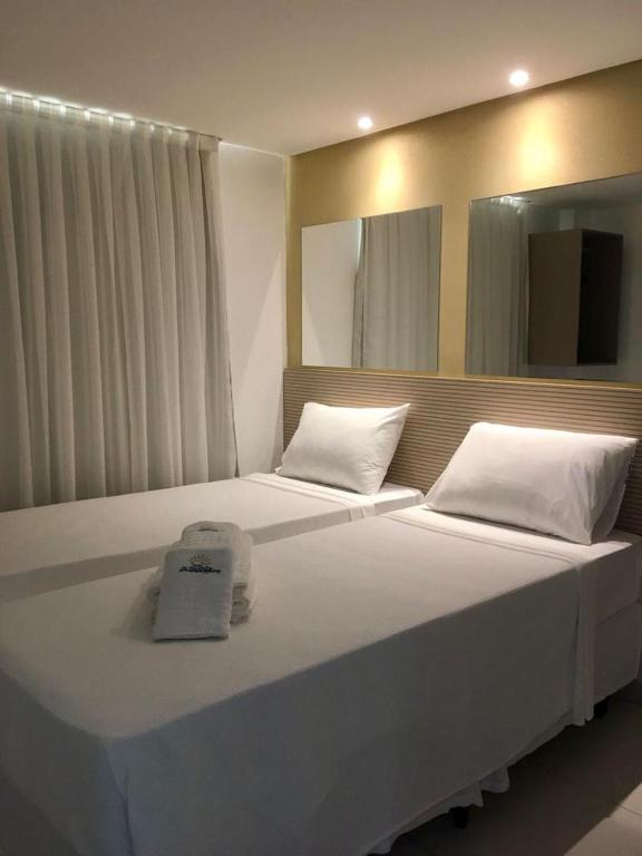 Cama ou camas em um quarto em Hotel Pousada Kairos Manaira