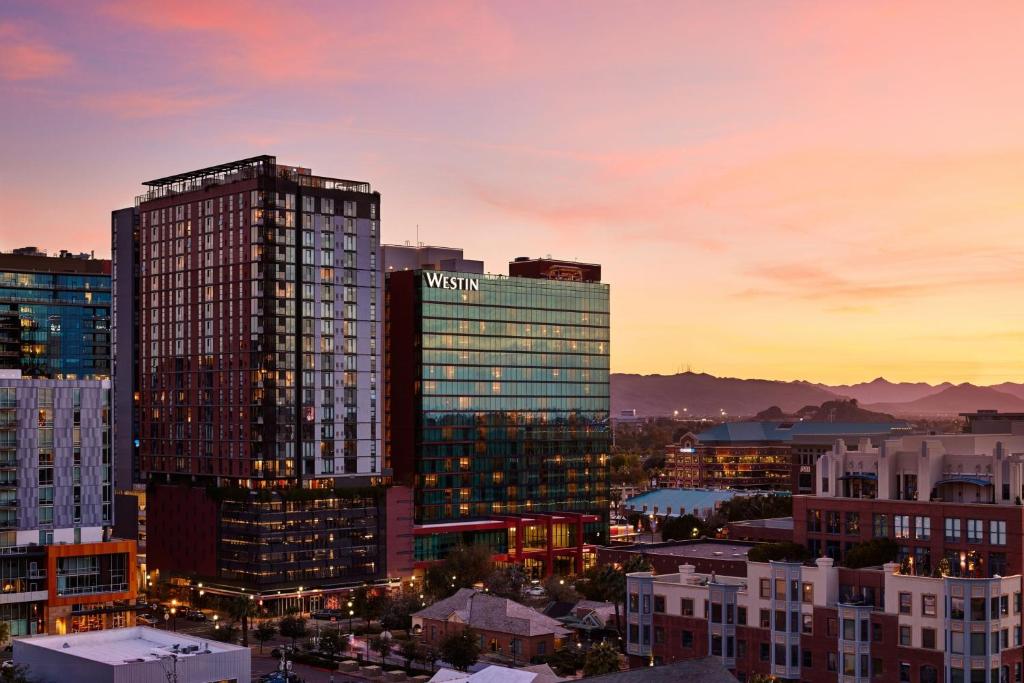 a view of a city skyline at sunset at The Westin Tempe in Tempe