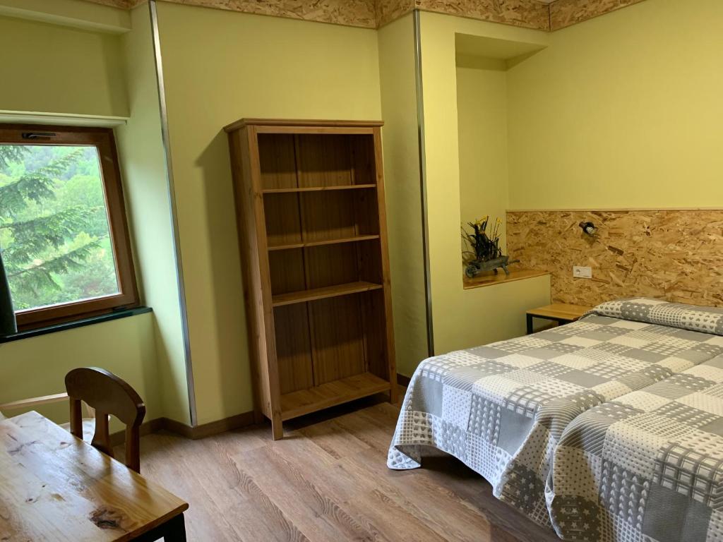 Postel nebo postele na pokoji v ubytování Hotel Or Blanc