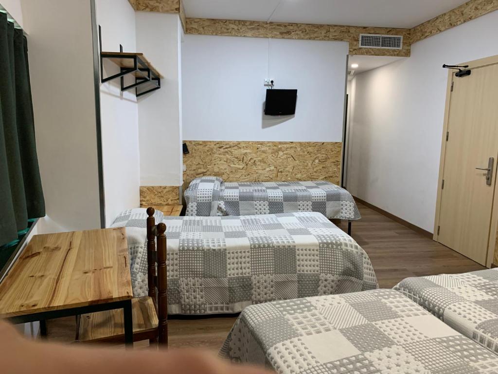 Postel nebo postele na pokoji v ubytování Hotel Or Blanc