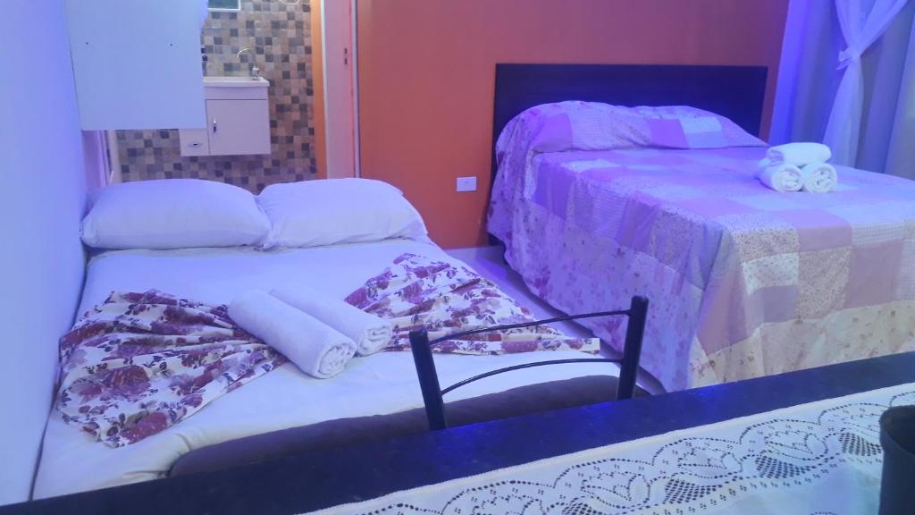 Postel nebo postele na pokoji v ubytování Parada Di Maria Guest House