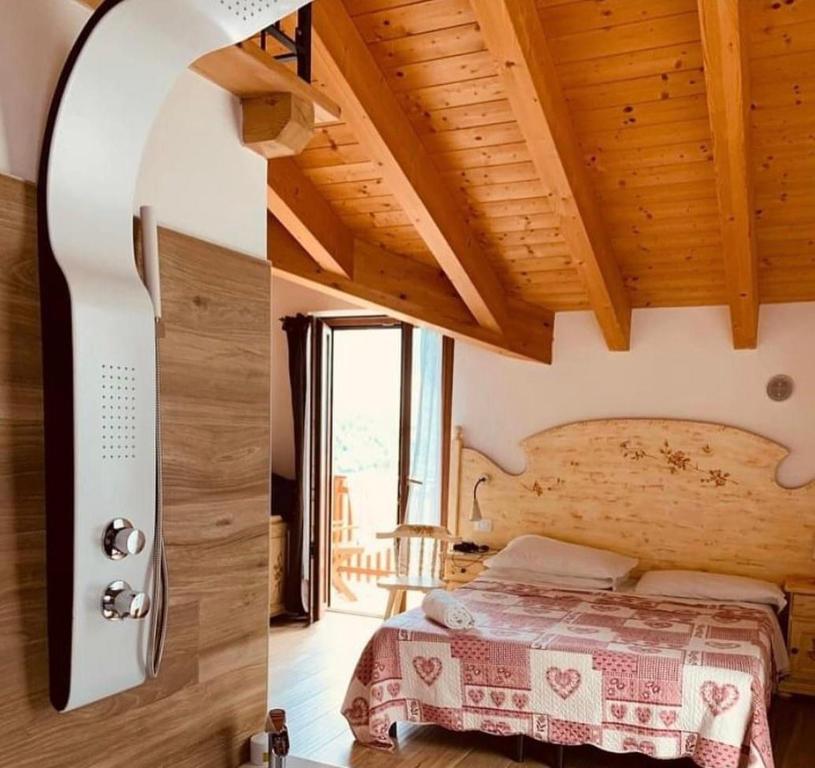 Postel nebo postele na pokoji v ubytování B&B Le Coccole