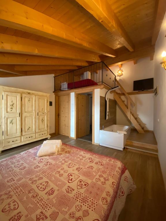Postel nebo postele na pokoji v ubytování B&B Le Coccole