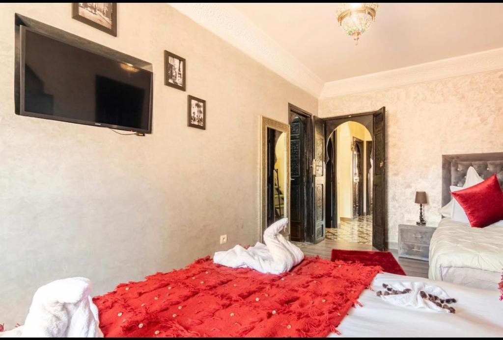 Postel nebo postele na pokoji v ubytování Riad Dar IMANE