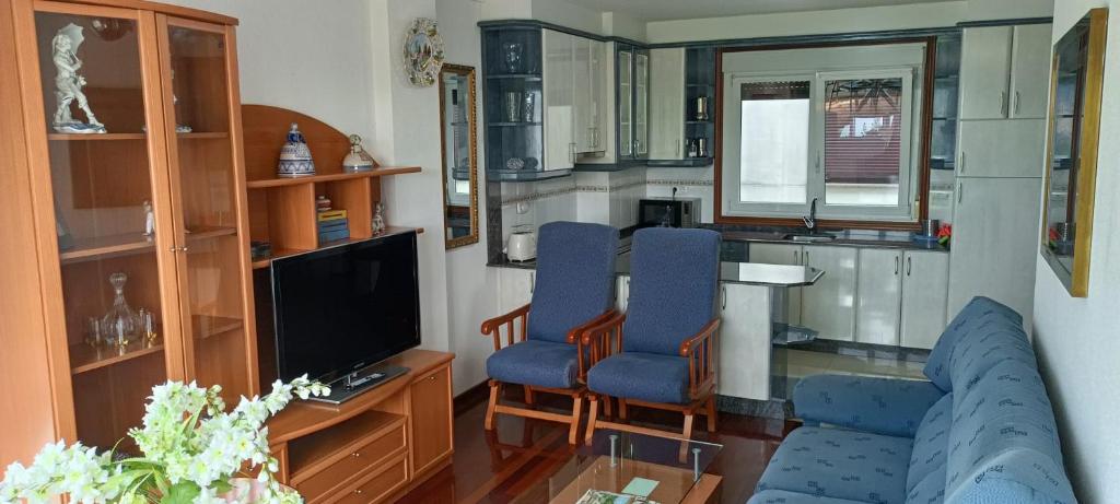 Telewizja i/lub zestaw kina domowego w obiekcie APARTAMENTO AVELINA