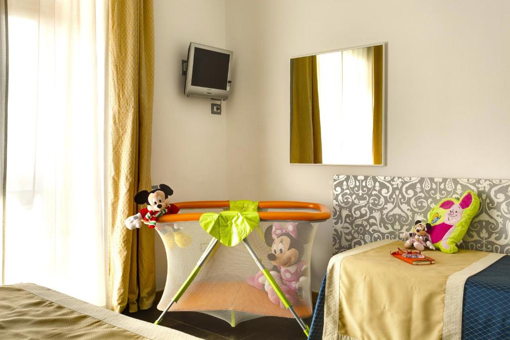 TV a/nebo společenská místnost v ubytování Hotel Marcantonio