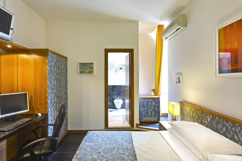 TV a/nebo společenská místnost v ubytování Hotel Marcantonio