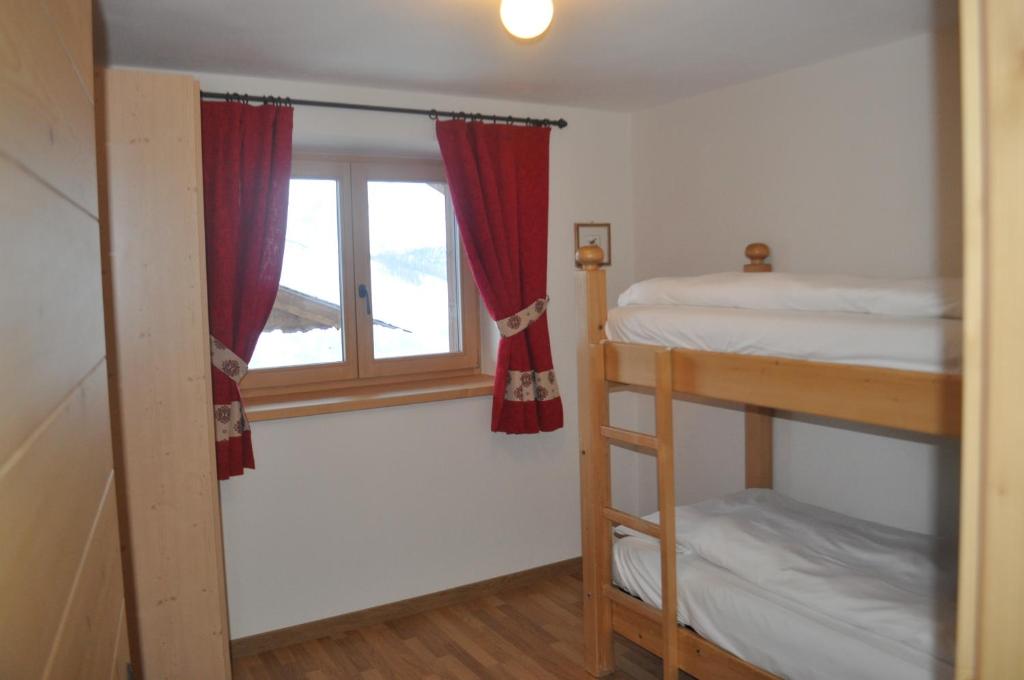 Posteľ alebo postele v izbe v ubytovaní Chalet Elena