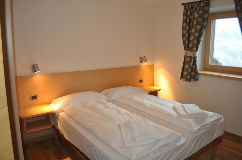 Posteľ alebo postele v izbe v ubytovaní Chalet Elena