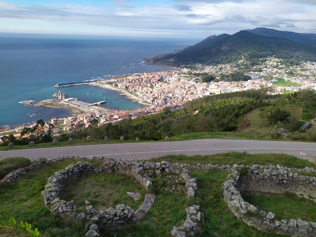 a view of a city from a hill with a road at MAR Y PLAYA in A Guarda