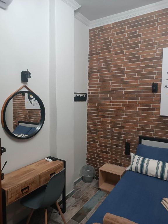 Łóżko lub łóżka w pokoju w obiekcie Grecos STAY SKIATHOS