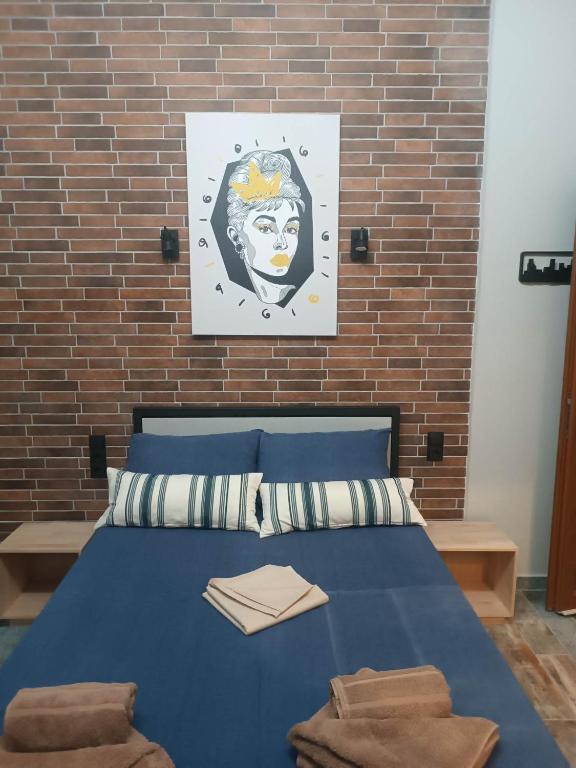 Łóżko lub łóżka w pokoju w obiekcie Grecos STAY SKIATHOS