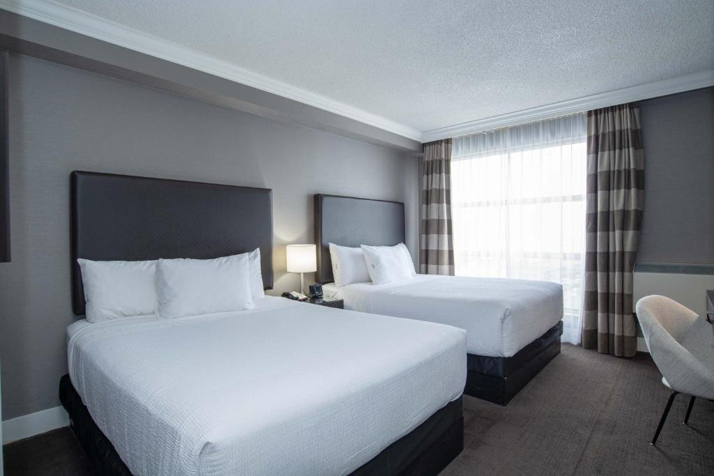 
Standard Suite, 2 Queen Beds, Sofa Bed
