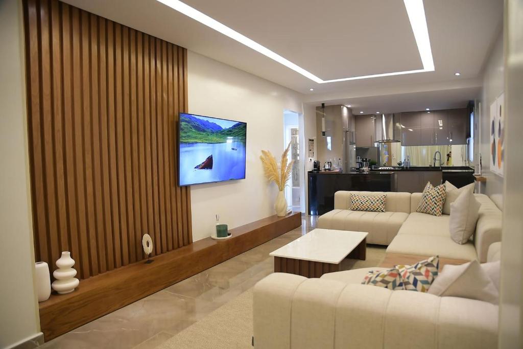 TV a/nebo společenská místnost v ubytování AKS Home appart 2 - CABONEGRO