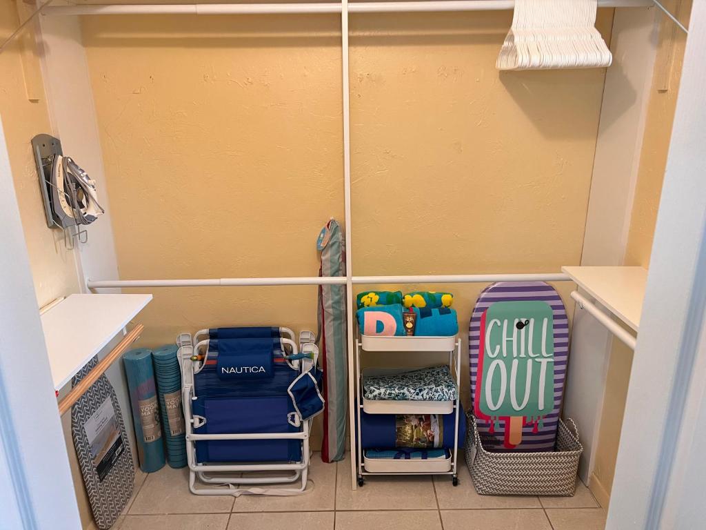 a small room with luggage and other items in it at The Boutique Guest House in Miami