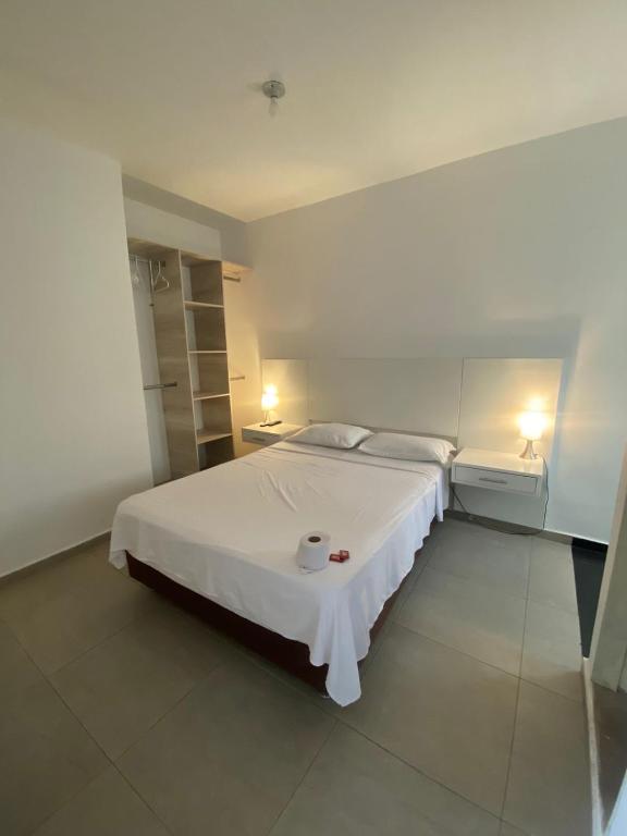Postel nebo postele na pokoji v ubytování HOTEL EBENEZER