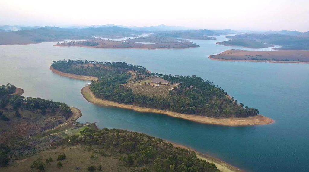 an aerial view of a large river with islands at TSIAZOMPANIRY ISLAND LODGE in Ambohimiadana