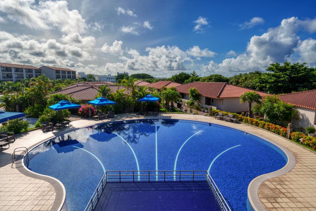 Kolam renang di atau dekat dengan GRANDVRIORESORT ISHIGAKIJIMA Ocean's Wing & Villa Garden