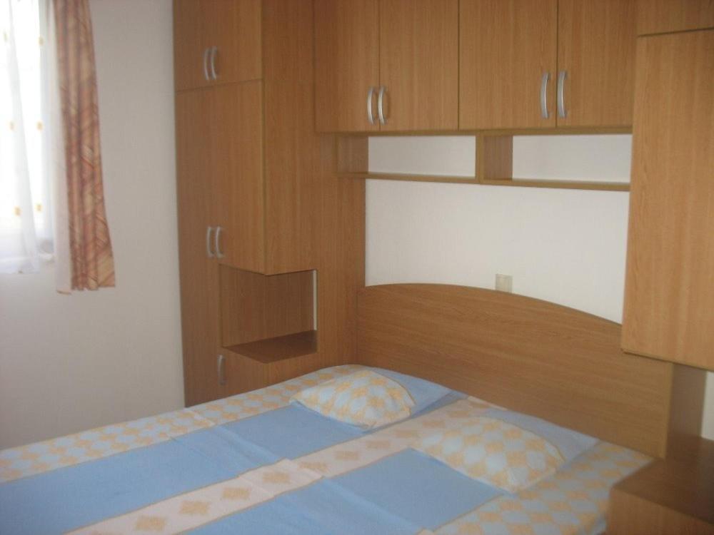 Postel nebo postele na pokoji v ubytování Apartments with a parking space Igrane, Makarska - 13535