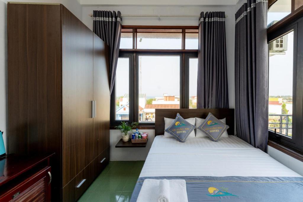 Posteľ alebo postele v izbe v ubytovaní Tan Hoang Minh Hotel