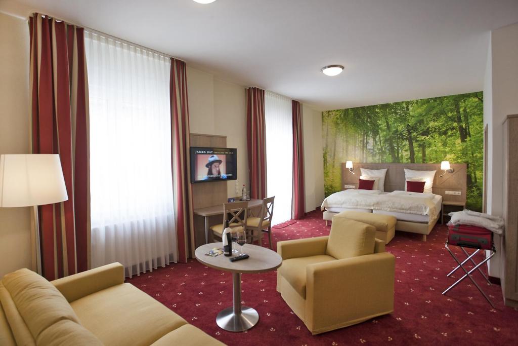Ένα ή περισσότερα κρεβάτια σε δωμάτιο στο Zum Ochsen
