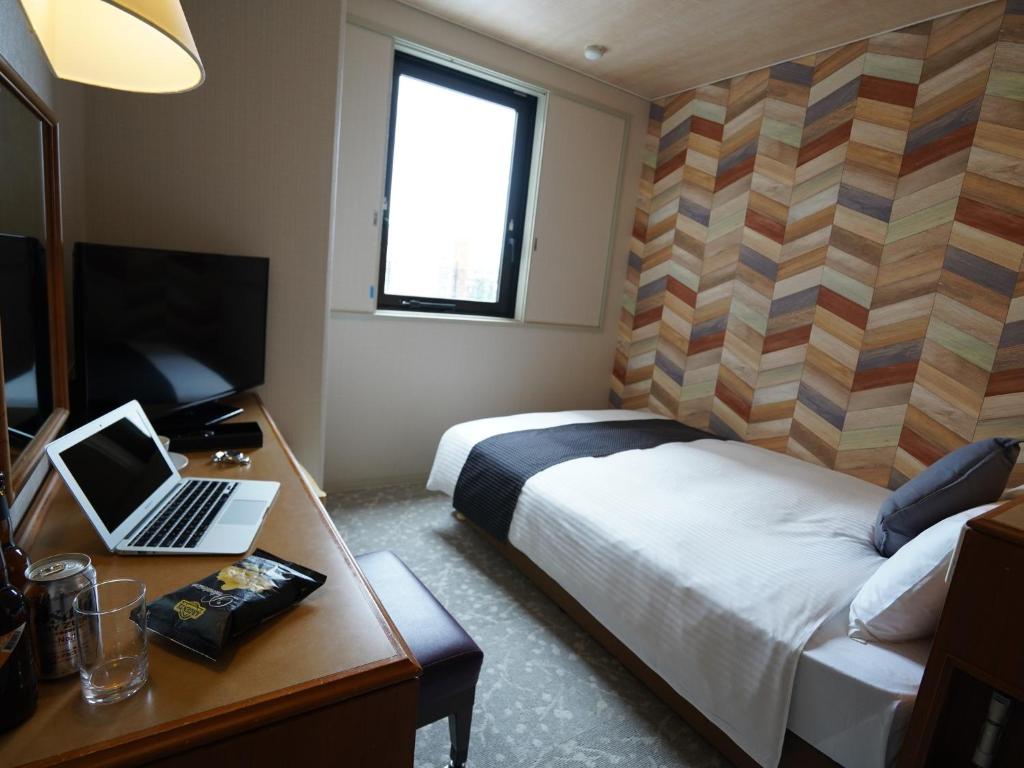 TV a/nebo společenská místnost v ubytování Hotel New Gaea Itoshima