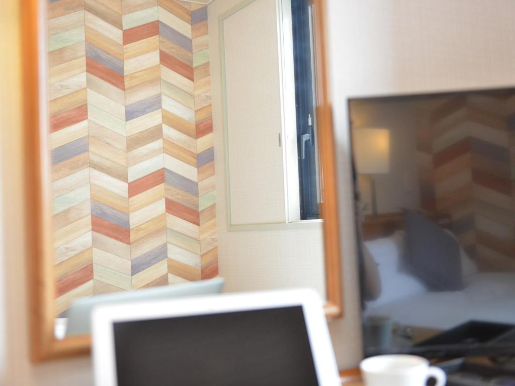 TV a/nebo společenská místnost v ubytování Hotel New Gaea Itoshima