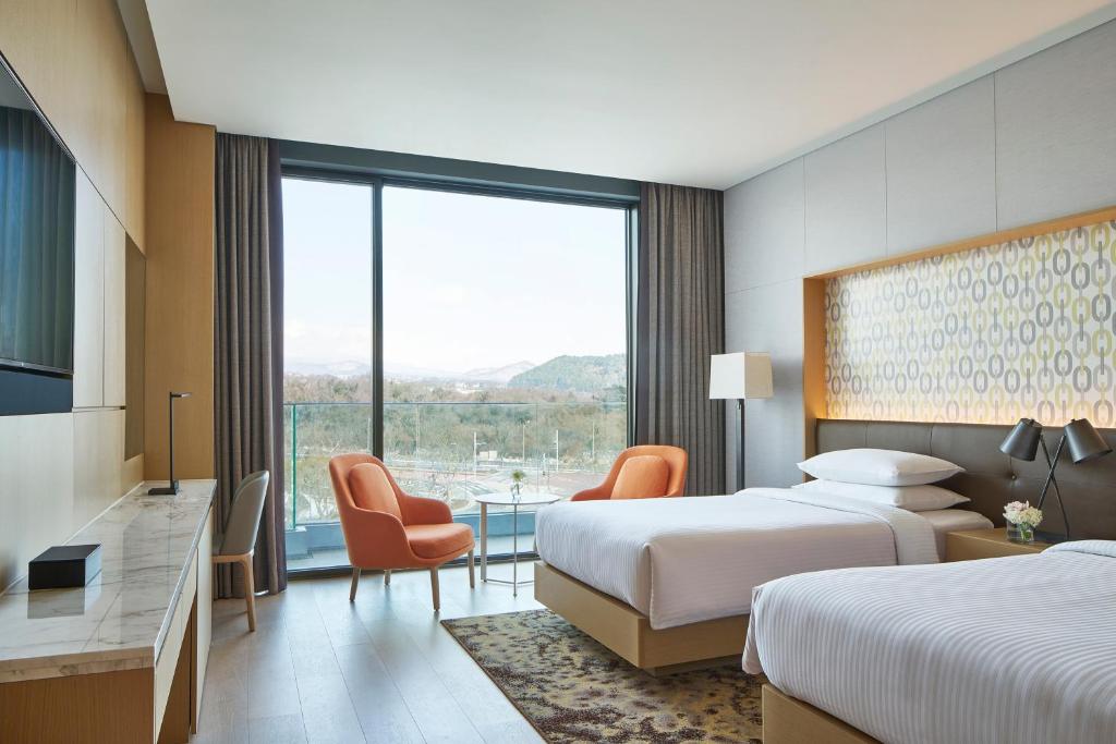 Posezení v ubytování Marriott Jeju Shinhwa World Hotel