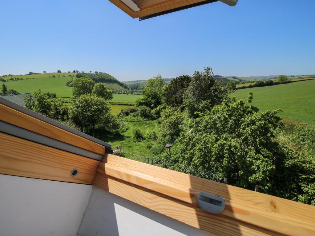 a view of the countryside from the balcony of a house at 1 Hetfield Cottages in Bishops Castle