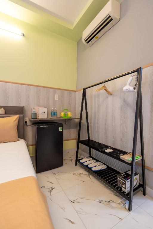 Postel nebo postele na pokoji v ubytování Cô Châu Homestay