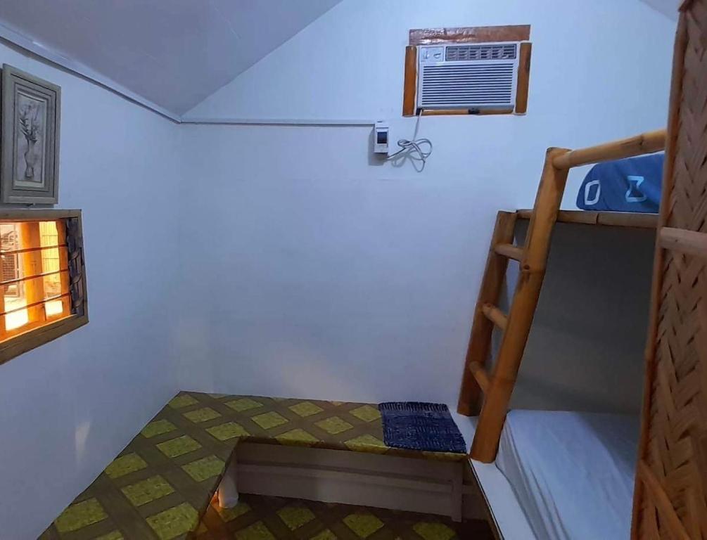 Postel nebo postele na pokoji v ubytování Las Colmena Kubotel/Lodge