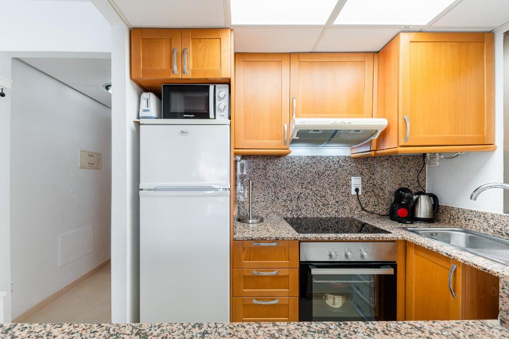 Kuchnia lub aneks kuchenny w obiekcie Apartament Playa de Los Locos