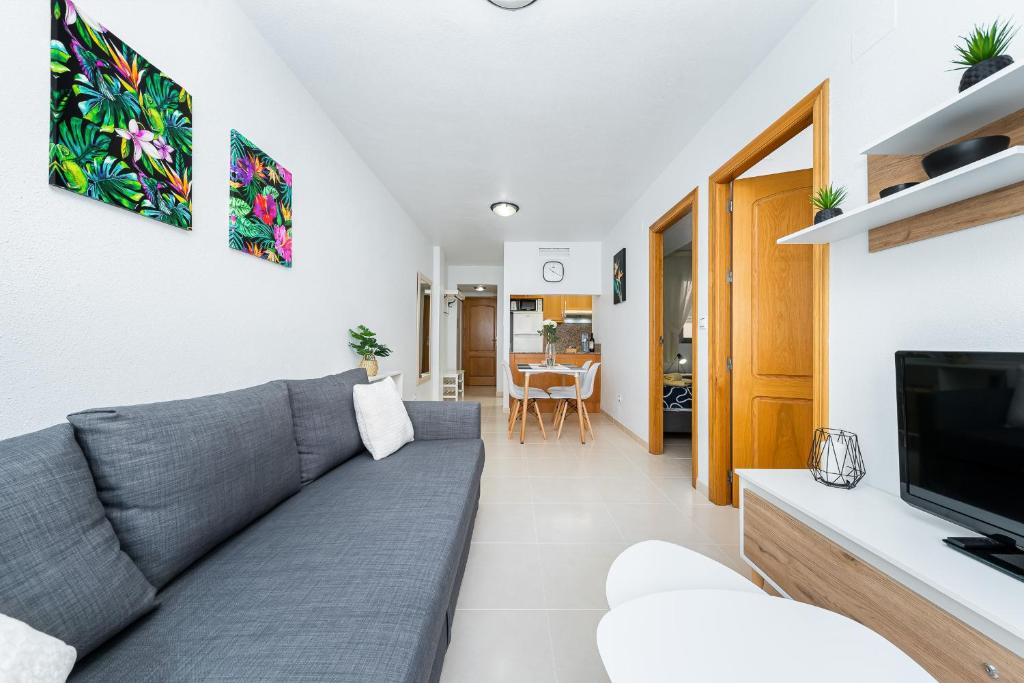 Telewizja i/lub zestaw kina domowego w obiekcie Apartament Playa de Los Locos